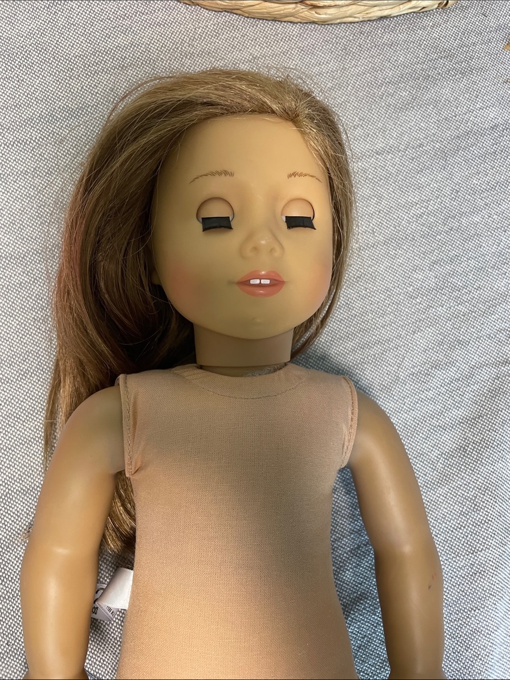 American Girl Blonde Brown-Haired Doll with off brand dress blue eyes